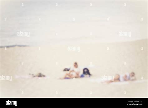 two people at the beach two people at the beach hi res stock