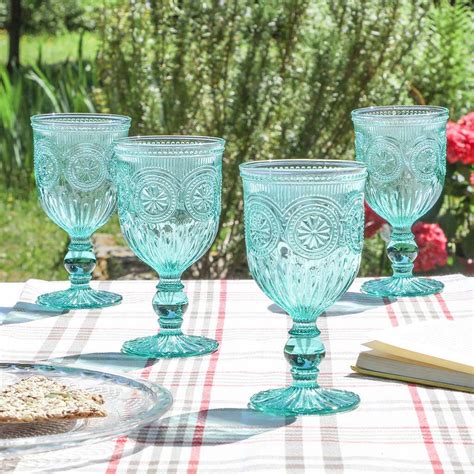 set of four turquoise embossed wine glasses by dibor