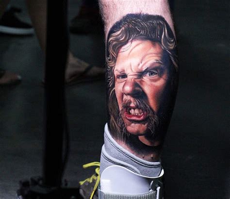 3d style colored very detailed angry man portrait tattoo on leg with