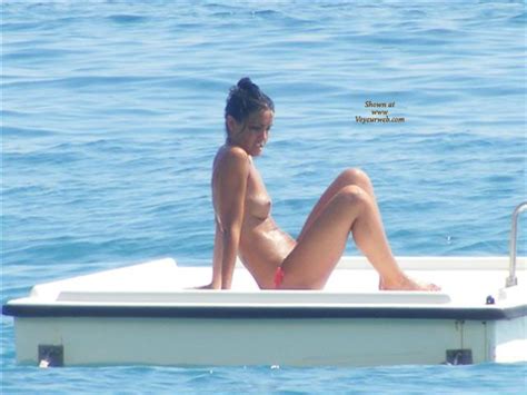 sitting on a swim platform topless september 2008 voyeur web hall of fame