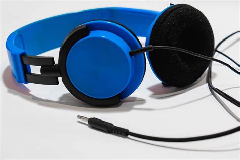 blue headphones  white surfacejpg creative commons bilder