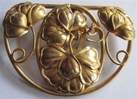 old large art nouveau floral gilt metal dress clip open work