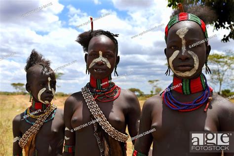 Three Young Girls Of Hamar Tribe Looking At The Camera Ethiopia East