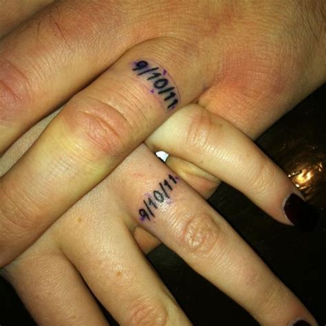 matching anniversary tattoos wedding date tattoos couple ring finger