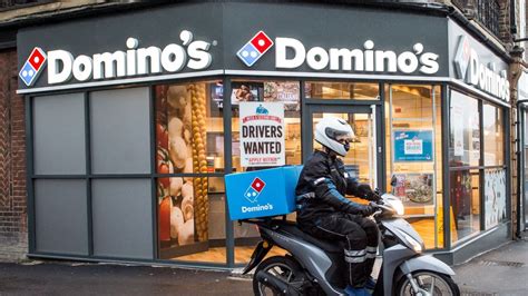 dominos dishes  bigger slice   pie business  times