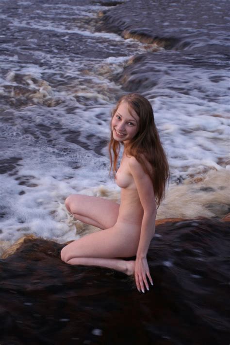 smiling teen cuttie masha p takes off her bikini in the river and shows her curvy body the