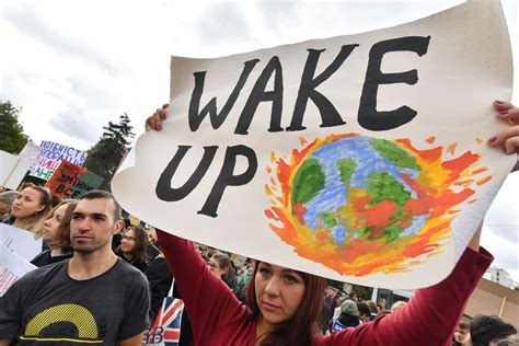 pictures millions  protesters worldwide    demand action  climate change