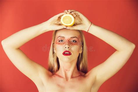 Woman With Creative Fashionable Makeup Hold Lemon Vitamin Stock Image
