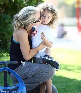 Kendra Wilkinson Shares A Kiss And A Cuddle With Her Son Hank Jr As