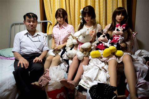 intimate portraits of japanese men and their sex dolls enjoying picnics