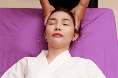 Asian Woman Enjoying A Salt Scrub Massage At Spa Stock Image Image Of