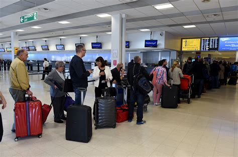 summer strike threat hanging  aberdeen international airport