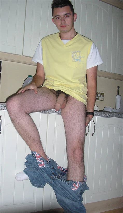 guy sitting on the cabinet top with dick expose gay twink porn