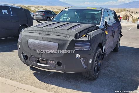 genesis gv electric suv spied   time