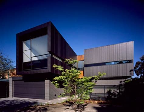design house  dark exterior super challenge  modern interior