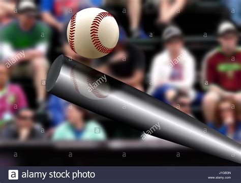 baseball bat hitting ball  spectator background stock