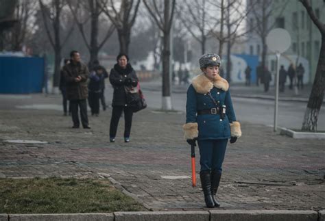 kim jong un employs force of attractive female traffic police officers