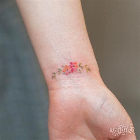 Mini Flower — Tattoos On Women — Flower Tattoos