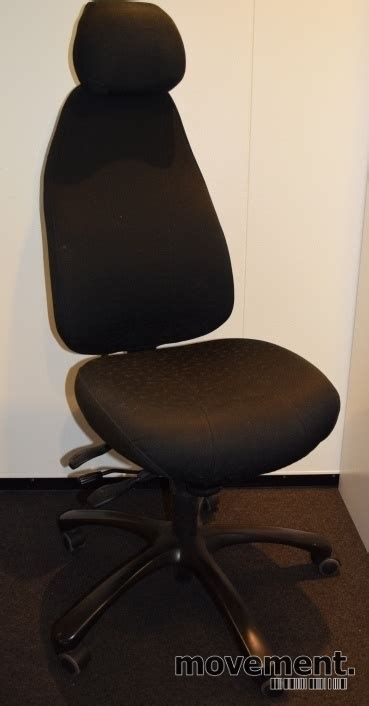 solgtkontorstol fra malmstolen modell  isortspraglet stoff med hoy rygg og nakkepute pent