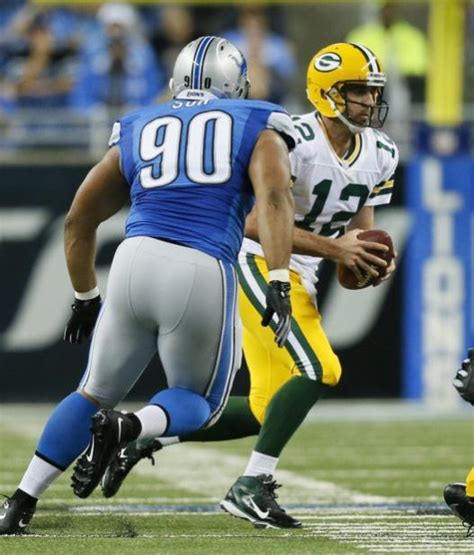 suh suspended for stepping on rodgers life in the red
