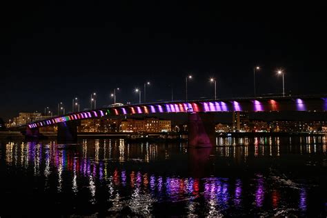 picture nighttime bridge downtown reflection colorful river