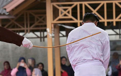 malaysian women caned  times   engaging  sexual