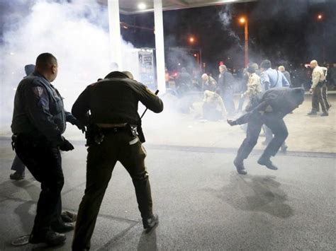 Protesters Near Ferguson Injure Cops With Bricks
