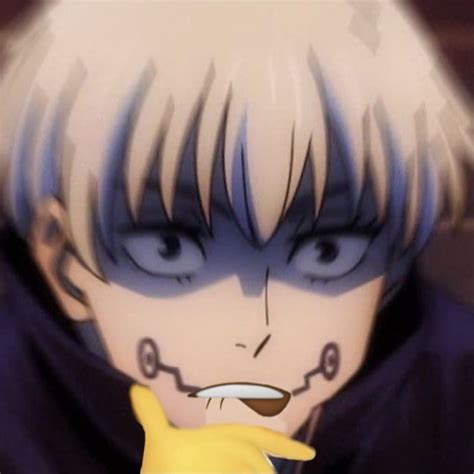 An Anime Character With Blue Eyes Holding A Banana