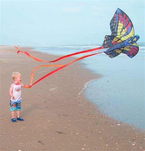 attention kids grab  kite  fly  kids kite day  hatteras village hatteras island