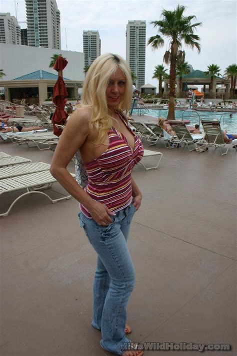 sexy blonde milf with huge tits takes off her blue jeans and gets stuffed