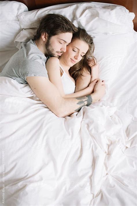 Couple Sleeping Hugging On Pillow By Alberto Bogo Couple Sleeping