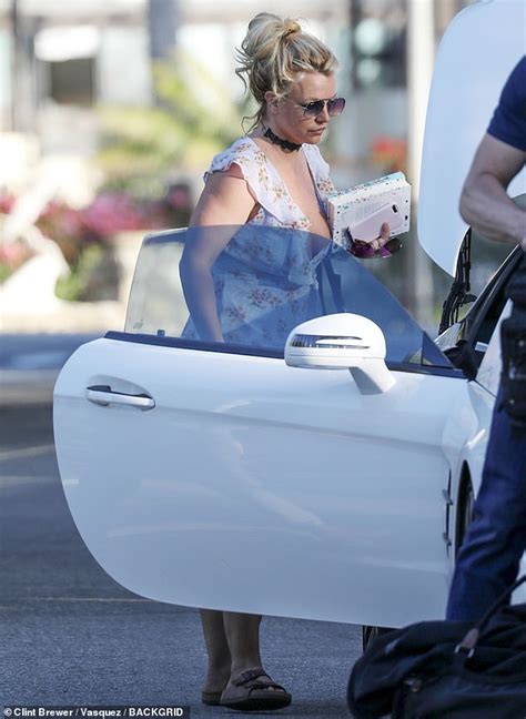 Britney Spears Looks Lovely In A Floral Dress While Visiting Santa
