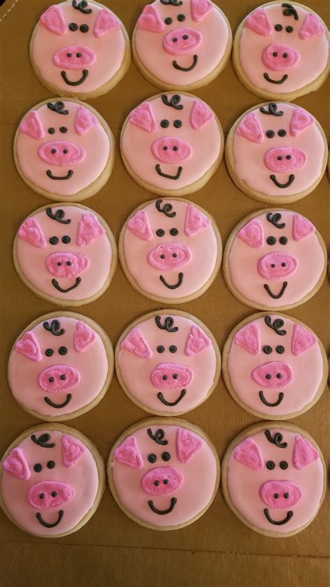 twelve decorated cookies  pig faces