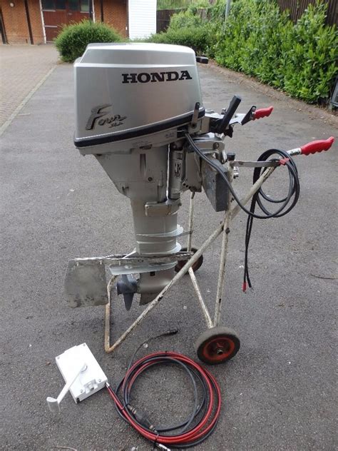 honda  hp  stroke outboard long shaft electric start boat engine  bourne