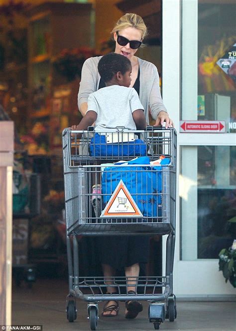 sean penn reveals blonde do on grocery trip with girlfriend charlize theron daily mail online