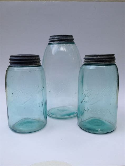 antique blue ball mason jar collection with original zinc lids