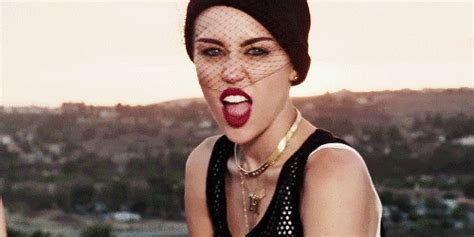 Miley Cyrus Sticking Her Tongue Out 2013 Pictures Popsugar Celebrity