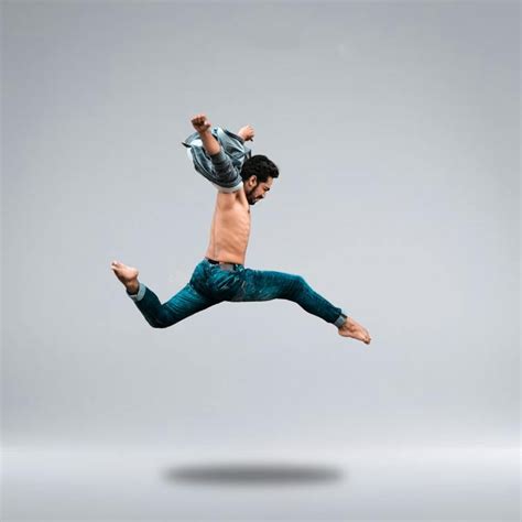 man jumping high  posing  stock photo