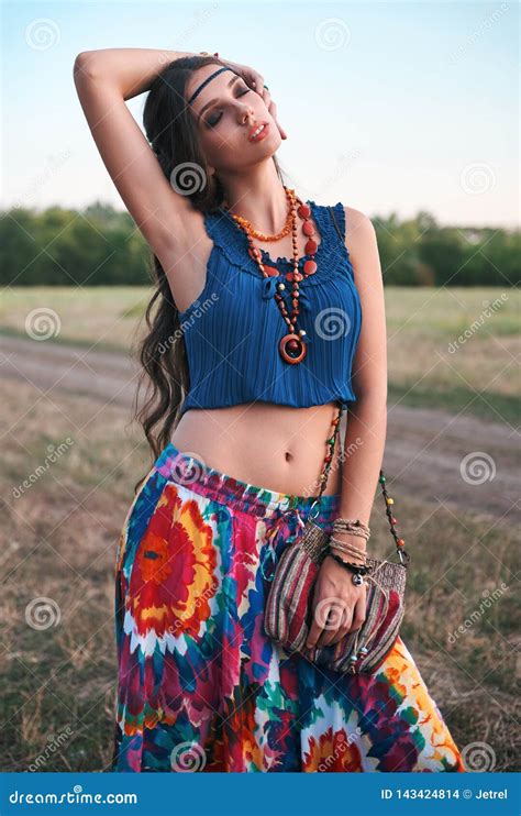 Outdoor Portrait Of Beautiful Young Boho Hippie Girl In Meadow At