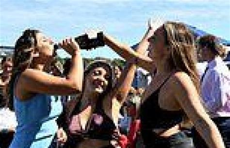aussies go wild race goers celebrate the return of melbourne cup after