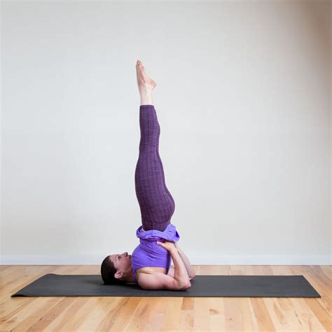 shoulderstand  common yoga poses pictures popsugar fitness photo