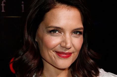 katie holmes on raising daughter suri we kind of grew up together