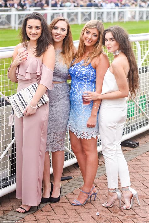 chester races punters brave showers in racy outfits daily mail online