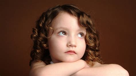 cute baby girl     sad face  brown background hd cute