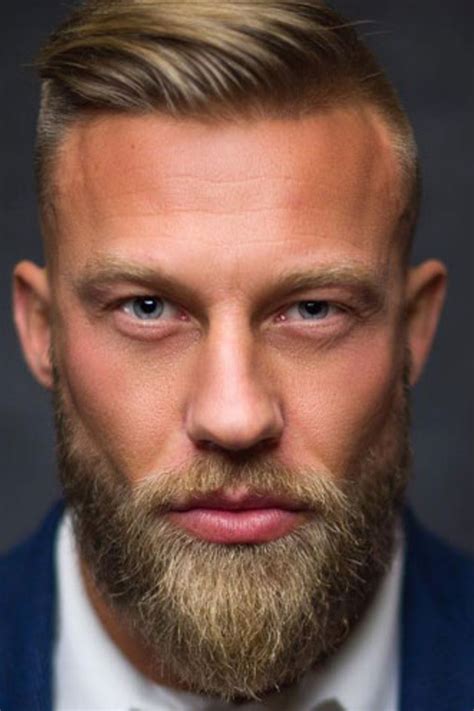 blonde full beard style with mid fade comb over hairstyle for men