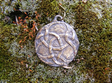 celtic irish shield  lugh bronze pendant  greenmanjewellery  etsy