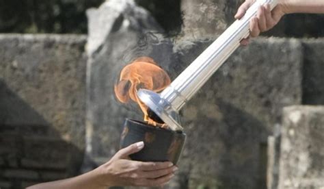 olympic torch lighting ceremony bizarre pagan ritual that