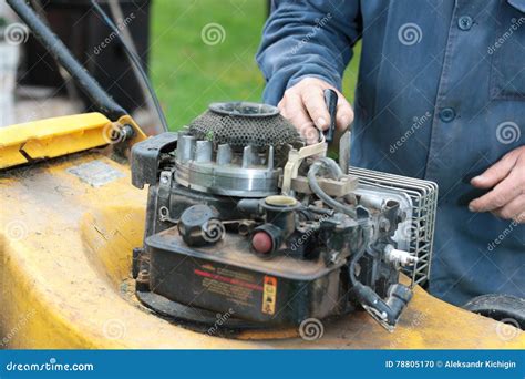repairing lawn mower engine stock photo image  machine background