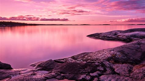 sunset scenery lake rocks pink sky 4k free desktop