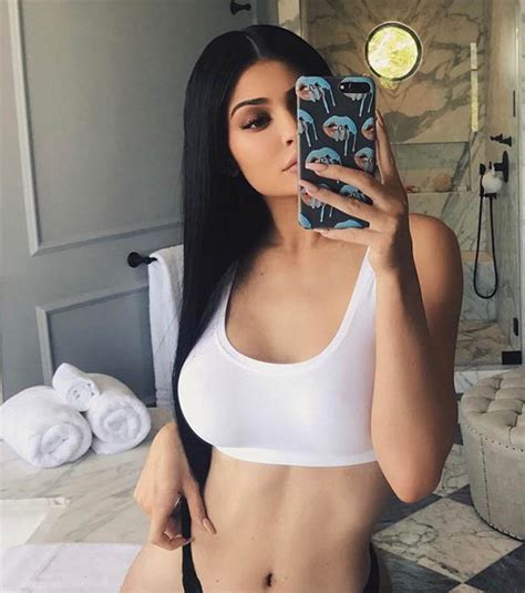 kylie jenner rocks see through swimsuit for wet and wild titillation daily star